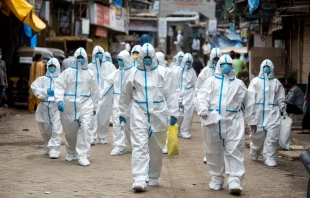 June 25, 2020: Health workers arrive at a check-up camp in Malad Manoej Paateel/Shutterstock